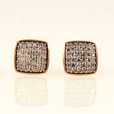 Lot 248 - A pair of square diamond set earstuds.