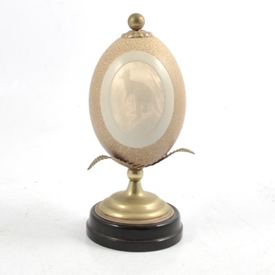 Lot 181 - A carved and mounted ostrich egg.