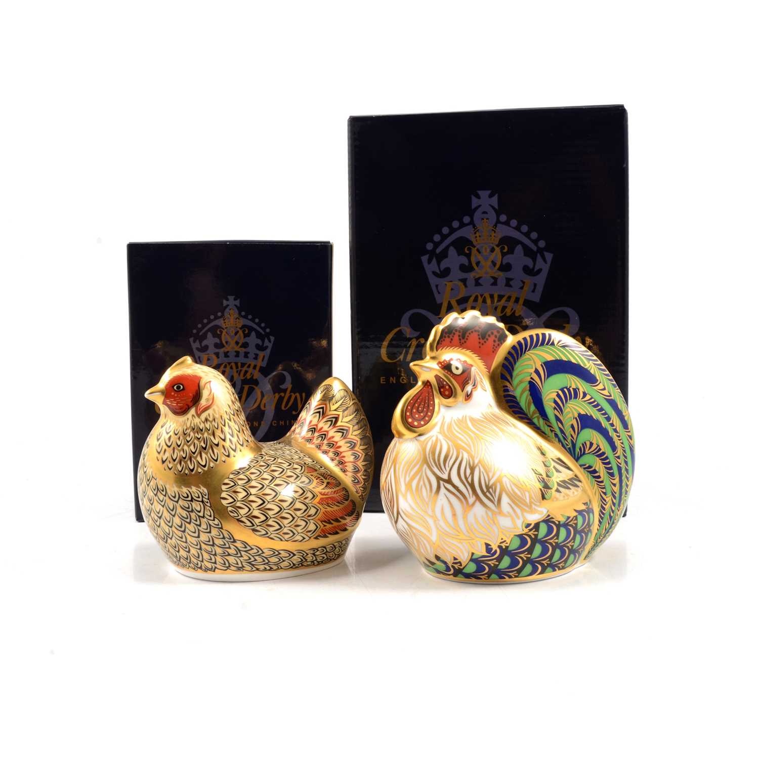Lot 15 - Two Royal Crown Derby Limited Edition paperweights, cockerel and hen, gold stoppers.