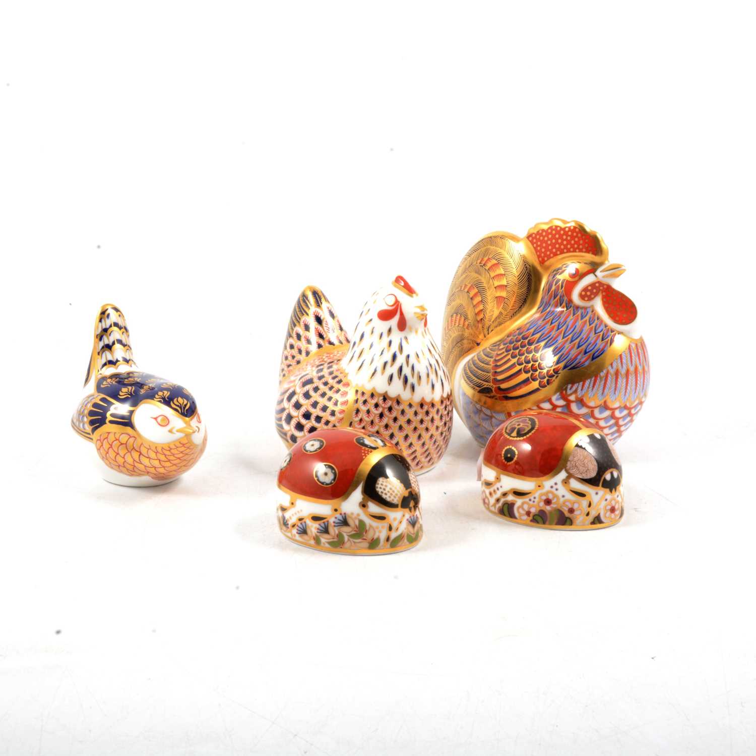 Lot 3 - Five Royal Crown Derby paperweights, cockerel and hen, bird, two ladybirds.