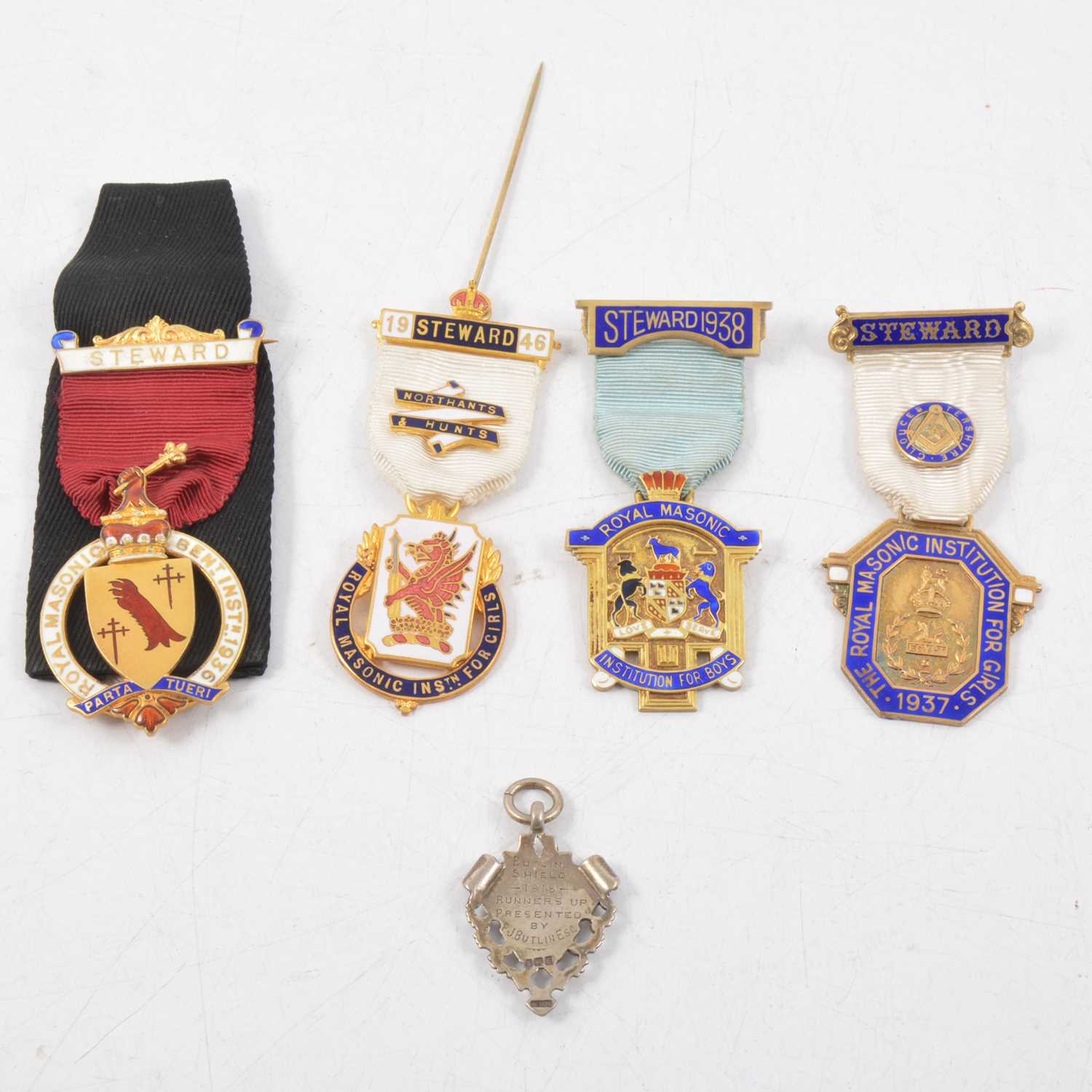 Lot 29 - Three silver gilt and enamel Royal Masonic Steward medals, a gilded metal medal and a silver runners up shield.