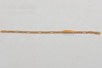 Lot 280 - A yellow metal identity bracelet marked Italy 750.