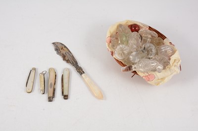 Lot 186 - Silver knife and fruit knives with mother of pearl handles, small penknife and glass bottle stoppers.