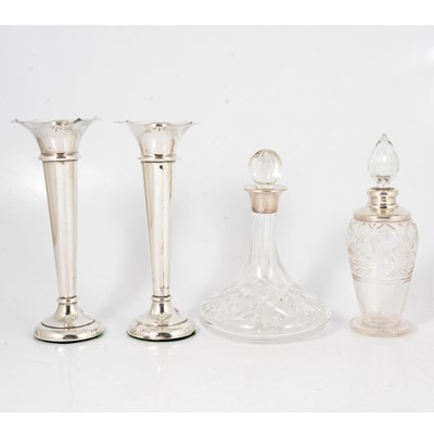 Lot 179 - Pair of silver spill vases, Birmingham 1913, and two cut glass decanters with silver collars.