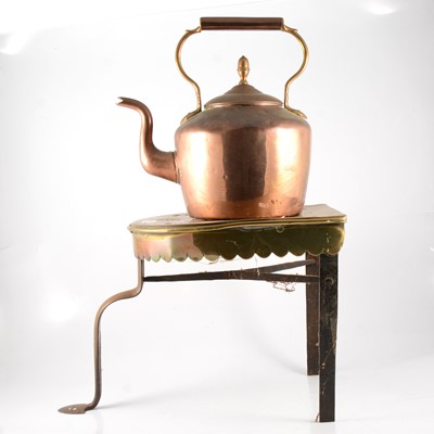 Lot 128 - Brass and iron trivet, plus a copper kettle.