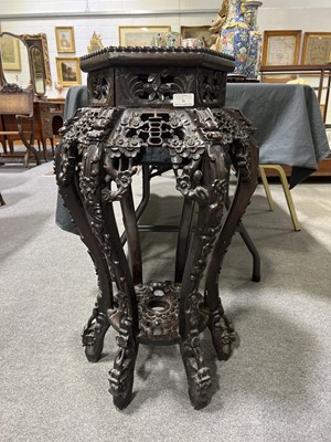 Lot 20 - Chinese carved hardwood jardiniere stand