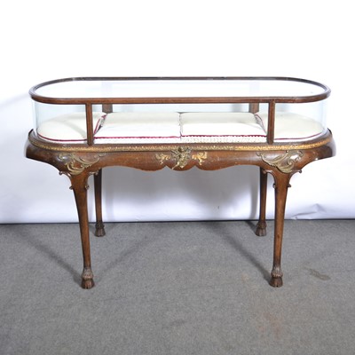 Lot 282 - Beechwood and gilt metal mounted display table