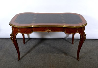 Lot 268 - Louis XV style 'kingwood' gilt metal mounted bureau plat