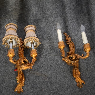 Lot 380 - Three lacquered gilt metal two-light wall brackets