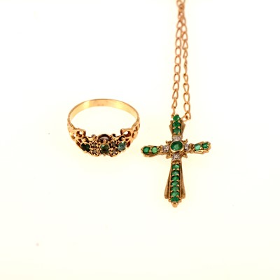 Lot 265 - An emerald and diamond cross and chain and ring.