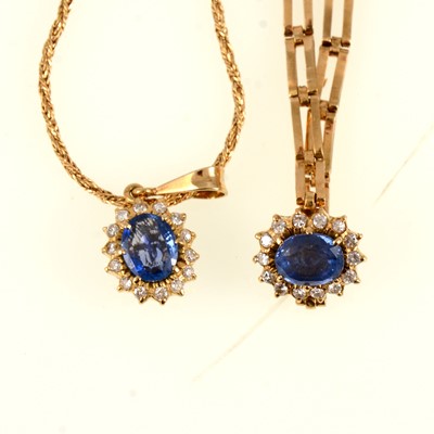 Lot 246 - A sapphire and diamond cluster pendant and bracelet set.