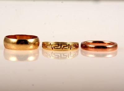 Lot 244 - Three gold rings.