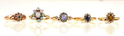 Lot 242 - Five gemset cluster rings.