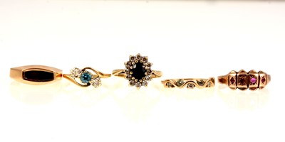 Lot 241 - Five gemset dress rings.