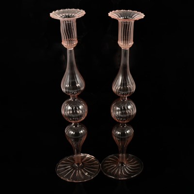 Lot 5 - Pair of pale pink Murano design glass candlesticks and a pair of White and floral trailed Murano candlesticks