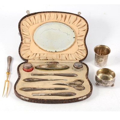 Lot 176 - Russian white metal salt and Scandanavian white metal manicure set, beaker and pickle fork.