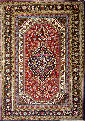 Lot 293 - Tabriz pattern rug.