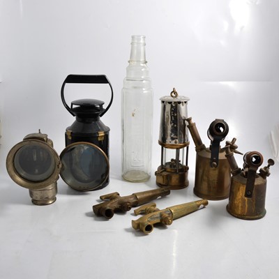 Lot 114 - Essolube bottle, Lucas lamp, B.R. (M) lamp, miners lamp, two brass taps, two blow lamps.