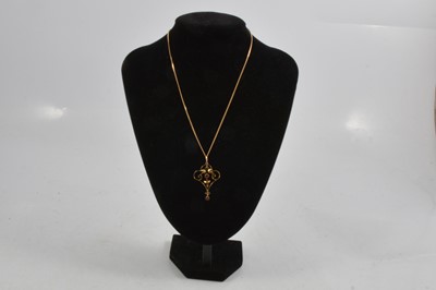 Lot 294 - An Edwardian style pendant and chain.