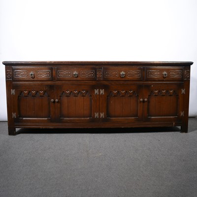 Lot 488 - Reproduction oak sideboard base, four frieze...