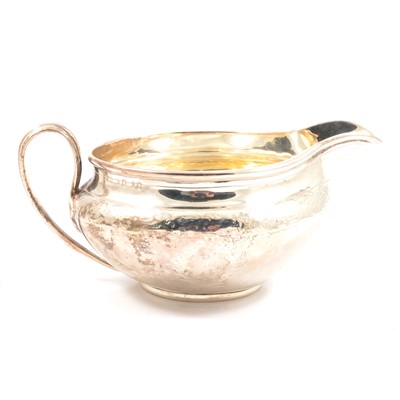 Lot 133 - George III silver milk jug, marks rubbed, probably London 1800.