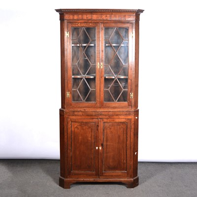 Lot 458 - George III oak and mahogany freestanding corner cupboard