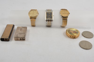 Lot 357 - A collection of wristwatches, cigarette lighters, bead necklaces, commemorative crowns.