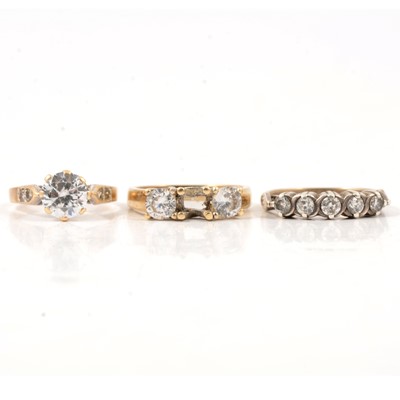 Lot 63 - Three synthetic white stone rings.
