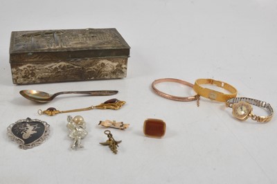 Lot 361 - A Japanese cigarette box, niello pendant, seal, bangle.