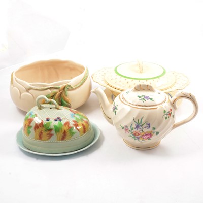 Lot 58 - Clarice Cliff Autumn Leaf bowl, lidded tureen, cheese dish, floral plate and teapot.