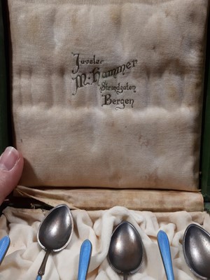 Lot 223 - Set of six Norwegian white metal and blue enamel coffee spoons.