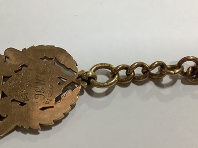 Lot 105 - A 9 carat rose gold Albert watch chain and cricket medallion.