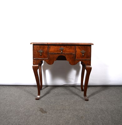 Lot 533 - Georgian walnut lowboy