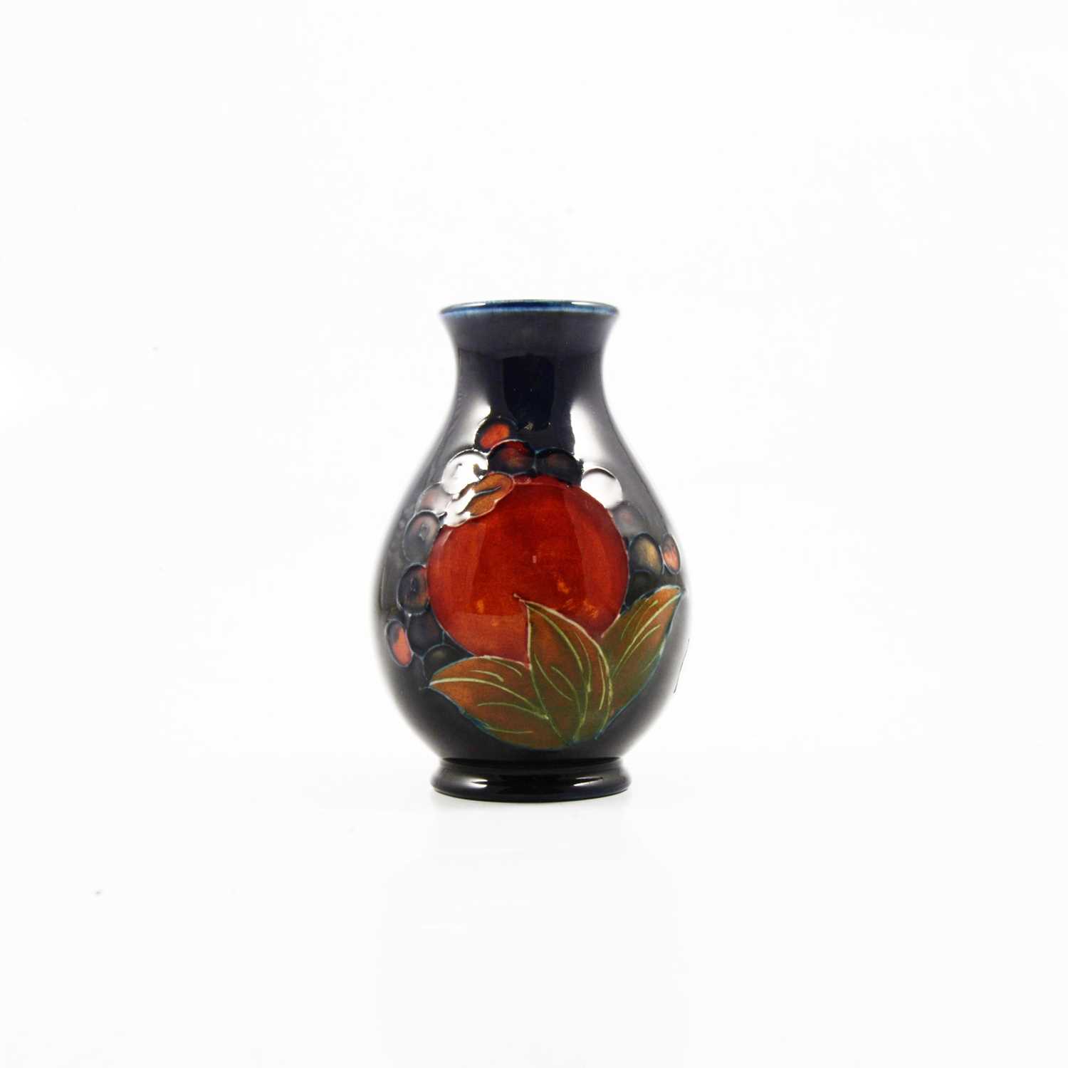 Lot 8 - Moorcroft Pottery Pomegranate vase.