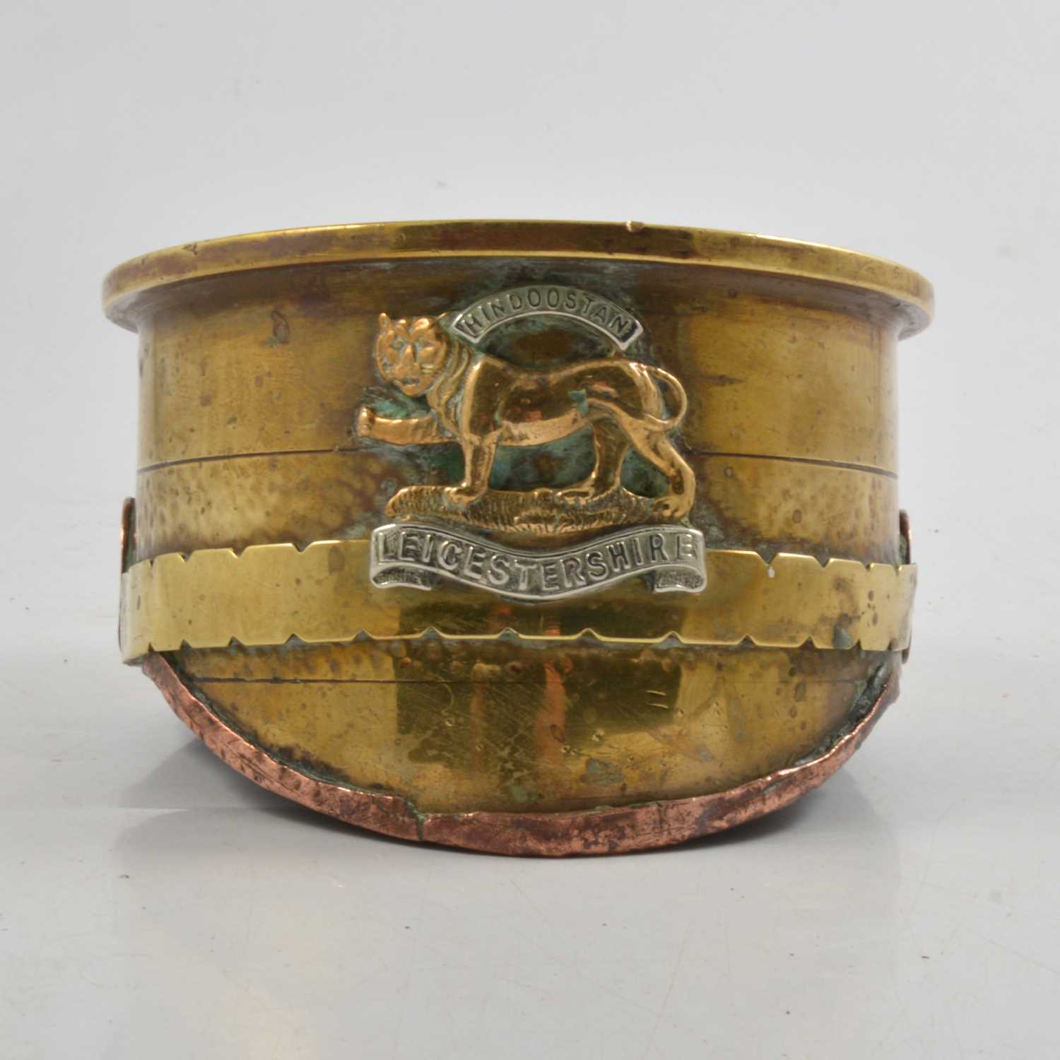 Lot 184 - Military: WWI Trench art peaked cap ashtray / paperweight.