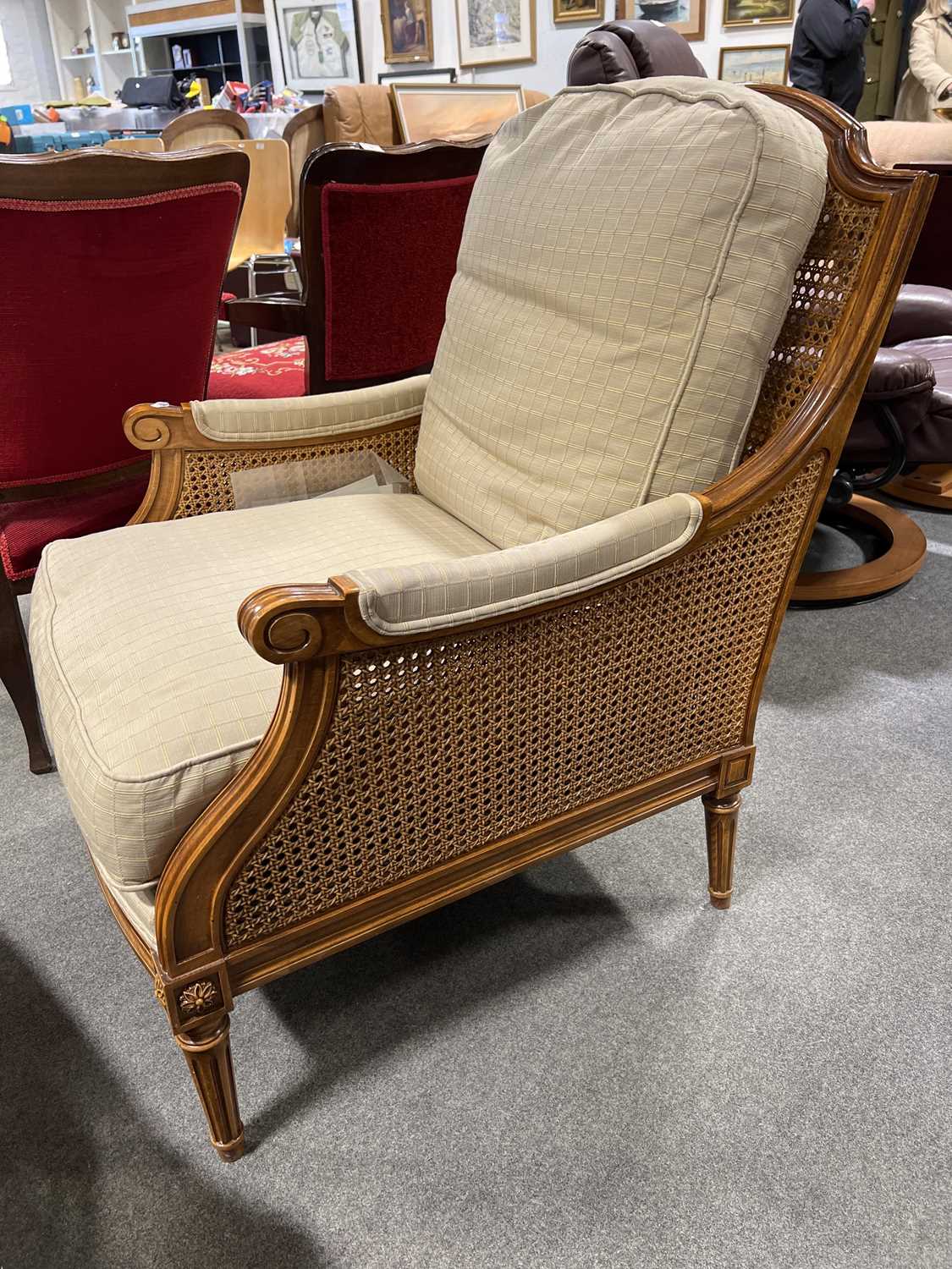 Lot 423 Modern stained beechwood bergere chair,