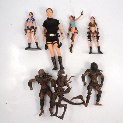 Lot 153 - Three Laura Croft figures and three Alien / Predator figures.