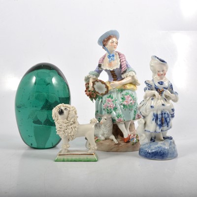 Lot 89 - Victorian green glass dumpy paperweight, continental figures, and a small Staffordshire dog.