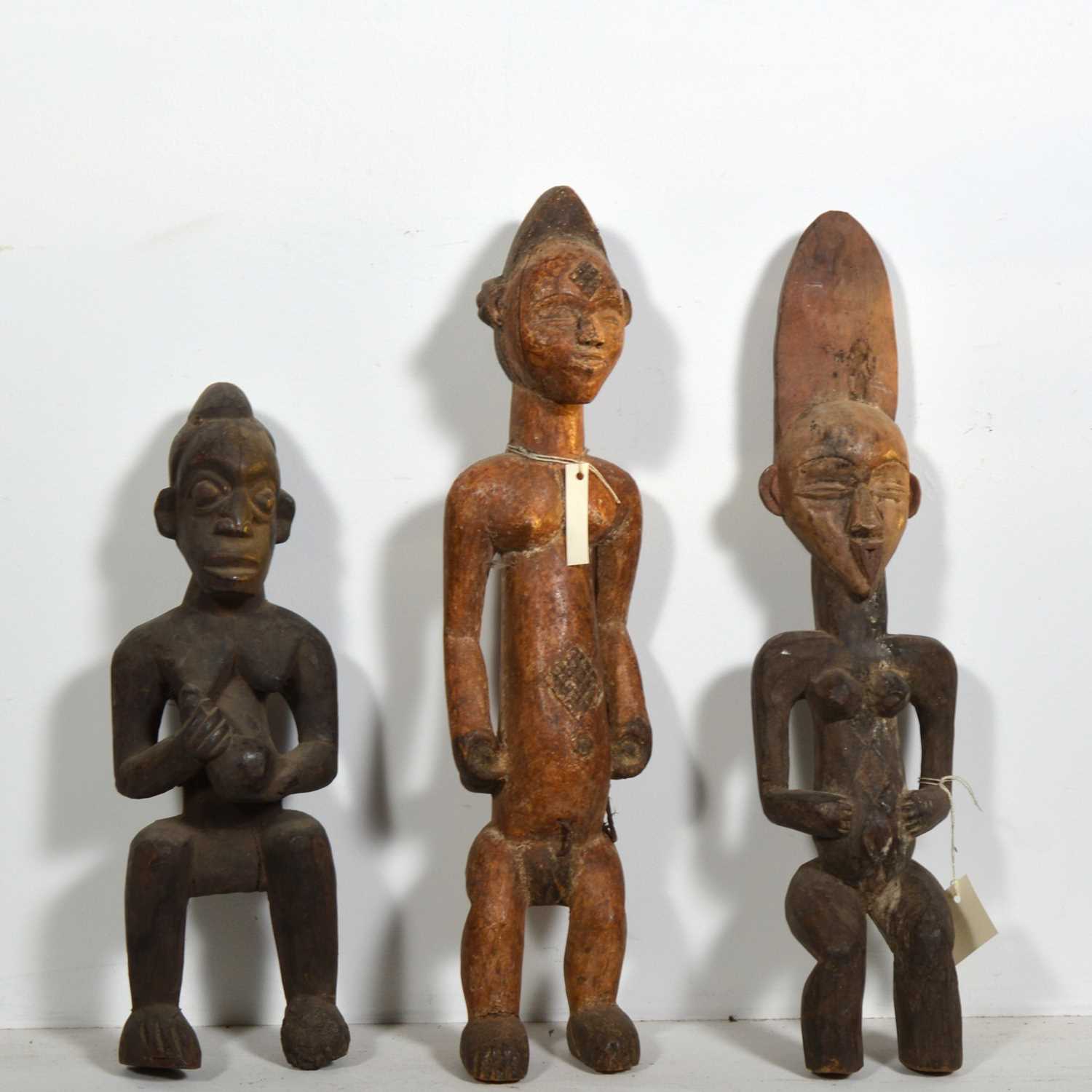 Lot 138 - Six carved wooden African tribal figures