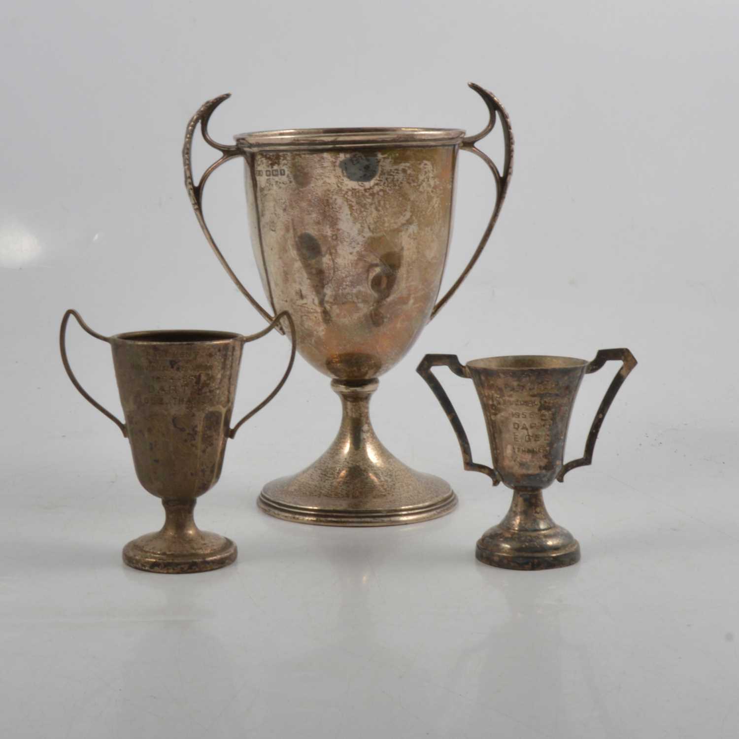 Lot 243 - Silver two-handled trophy cup, Stevenson & Law, Sheffield 1917, and two small plated trophy cups.