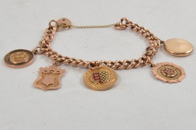 Lot 281 - A rose metal bracelet with five medallions, 9ct.