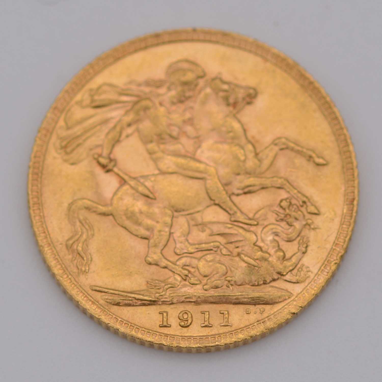 Lot 309 - George V gold Sovereign coin, 1911, 8g.