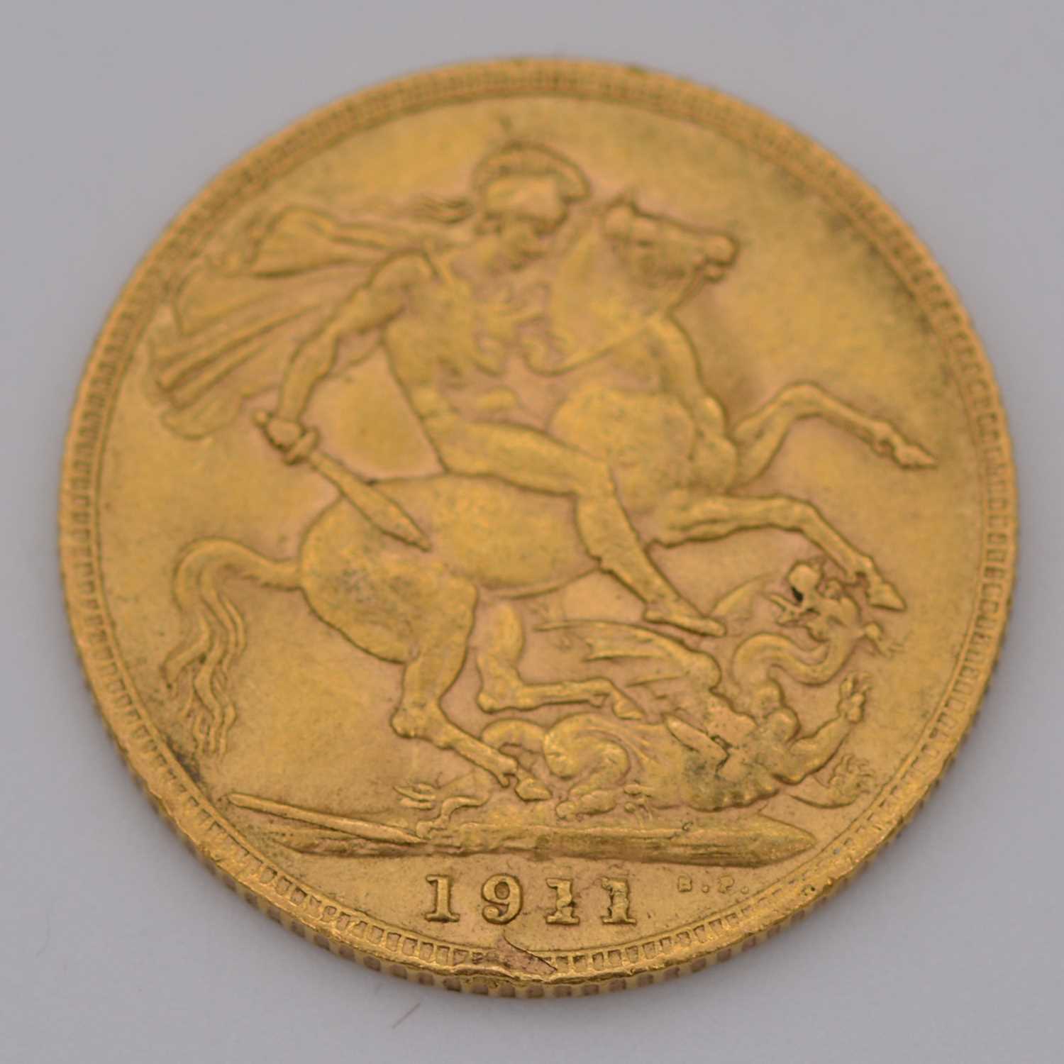 Lot 308 - George V gold Sovereign coin, 1911, 8g.