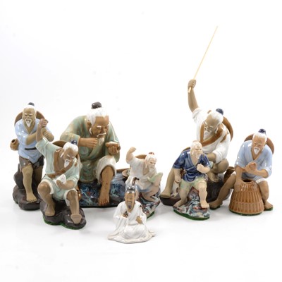 Lot 57 - Eight Chinese part glazed figures