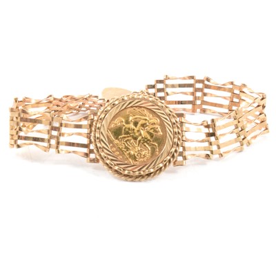 Lot 69 - A Gold Half Sovereign gate link bracelet.