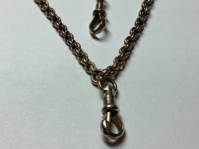 Lot 108 - A Victorian yellow metal chain in two sections.
