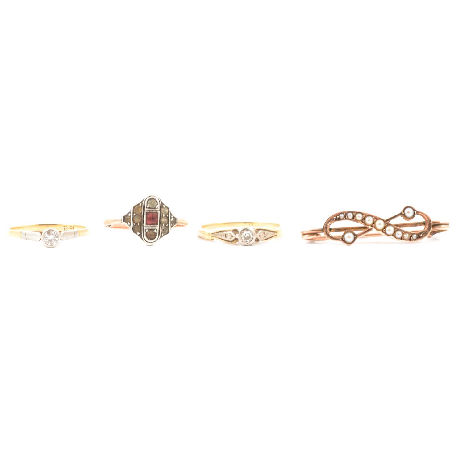 Lot 55 - Three rings and a small seed pearl bar brooch.