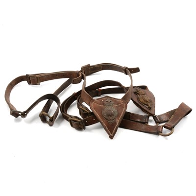 Lot 197 - Two military leather martingales with badges.