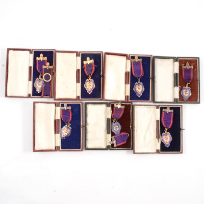 Lot 121 - Masonic interest - Seven silver gilt Manchester Unity Oddfellows jewels and two incomplete ribbons.