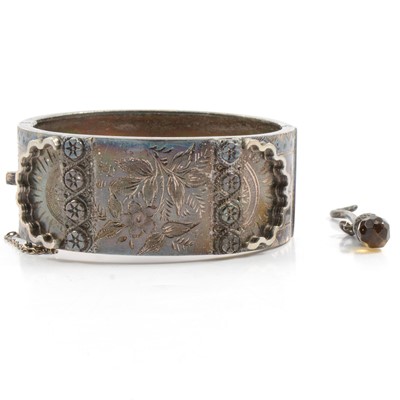 Lot 195 - A Victorian silver half hinged bangle and small glove button hook.